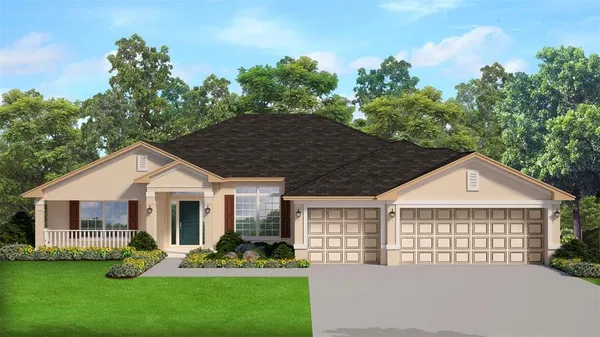 a front view of a house with a yard garden and patio