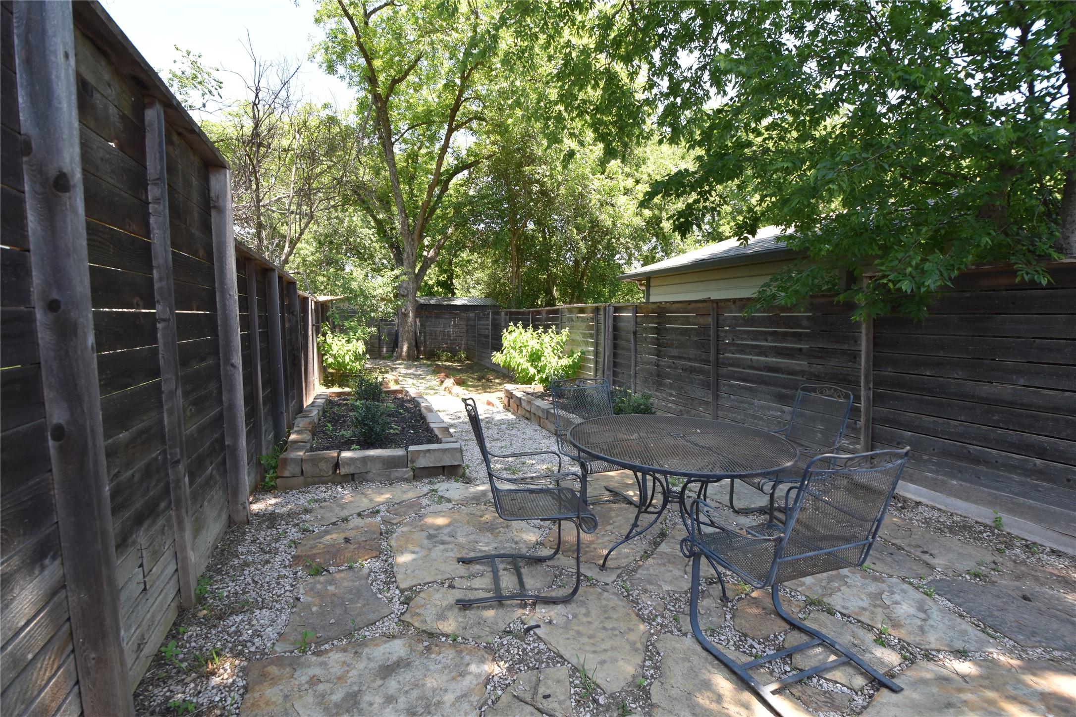 2012 Payne Avenue, Unit A Austin, TX 78757 - Photo 29 of 33 Stone patio with gravel accents in the private backyard area