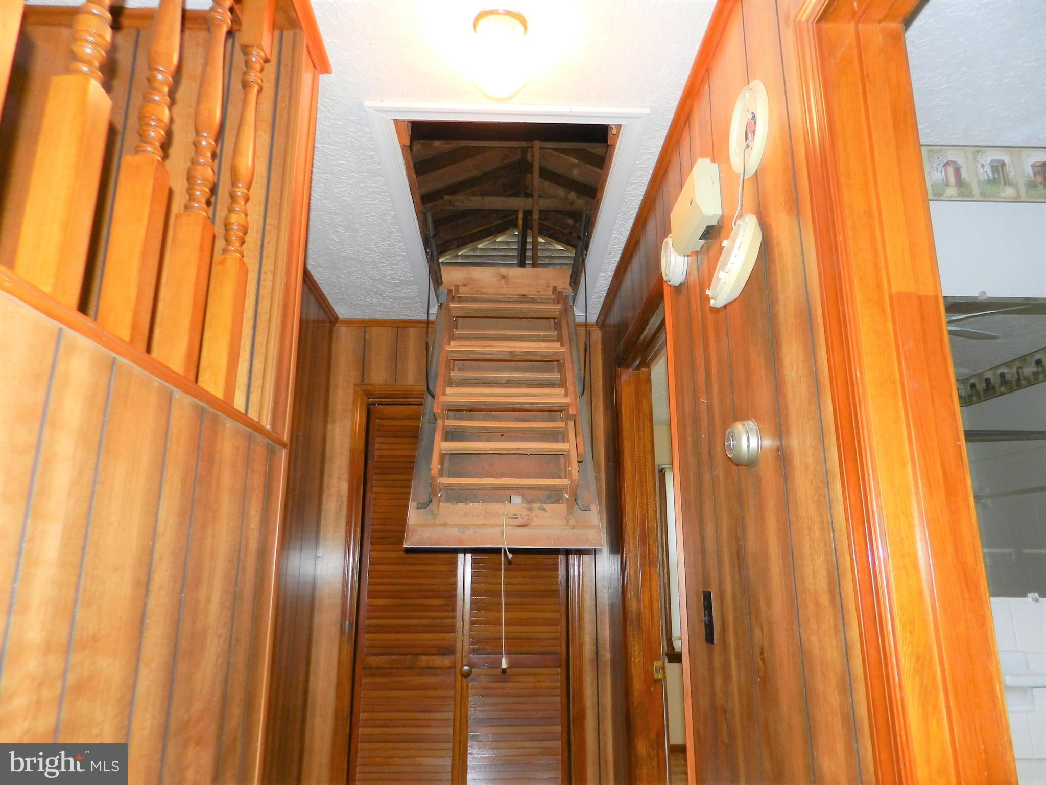 11269 Old Stillhouse Road Boston, VA 22713 - Photo 39 of 77 Attic pull down Stairs