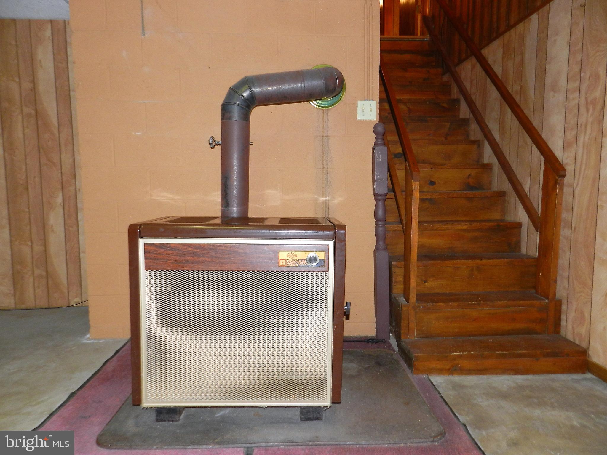 11269 Old Stillhouse Road Boston, VA 22713 - Photo 49 of 77 basement wood stove