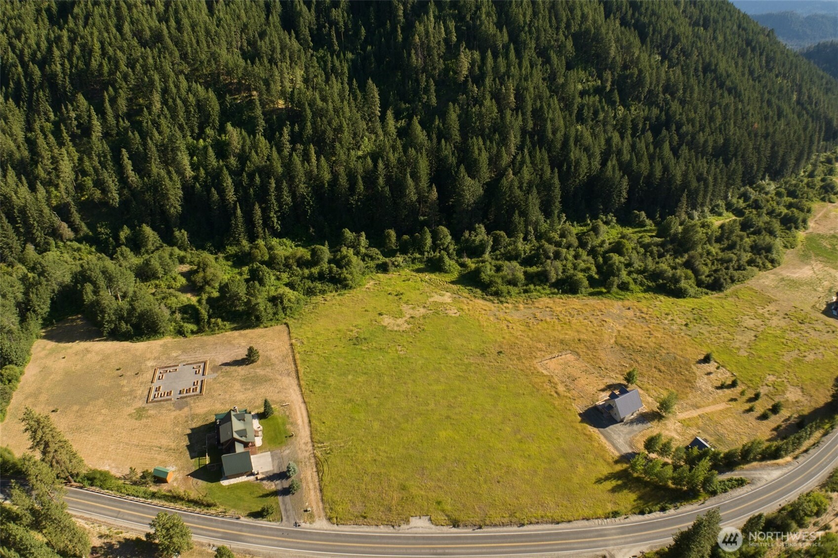 10479 Eagle Creek Road Leavenworth, WA 98826 - Photo 16 of 25 a view of swimming pool from a outdoor seating