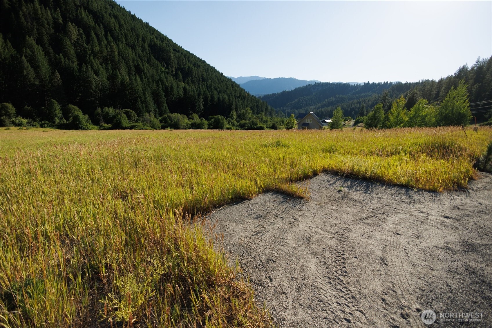 10479 Eagle Creek Road Leavenworth, WA 98826 - Photo 21 of 25 a view of a lake with a mountain in the background