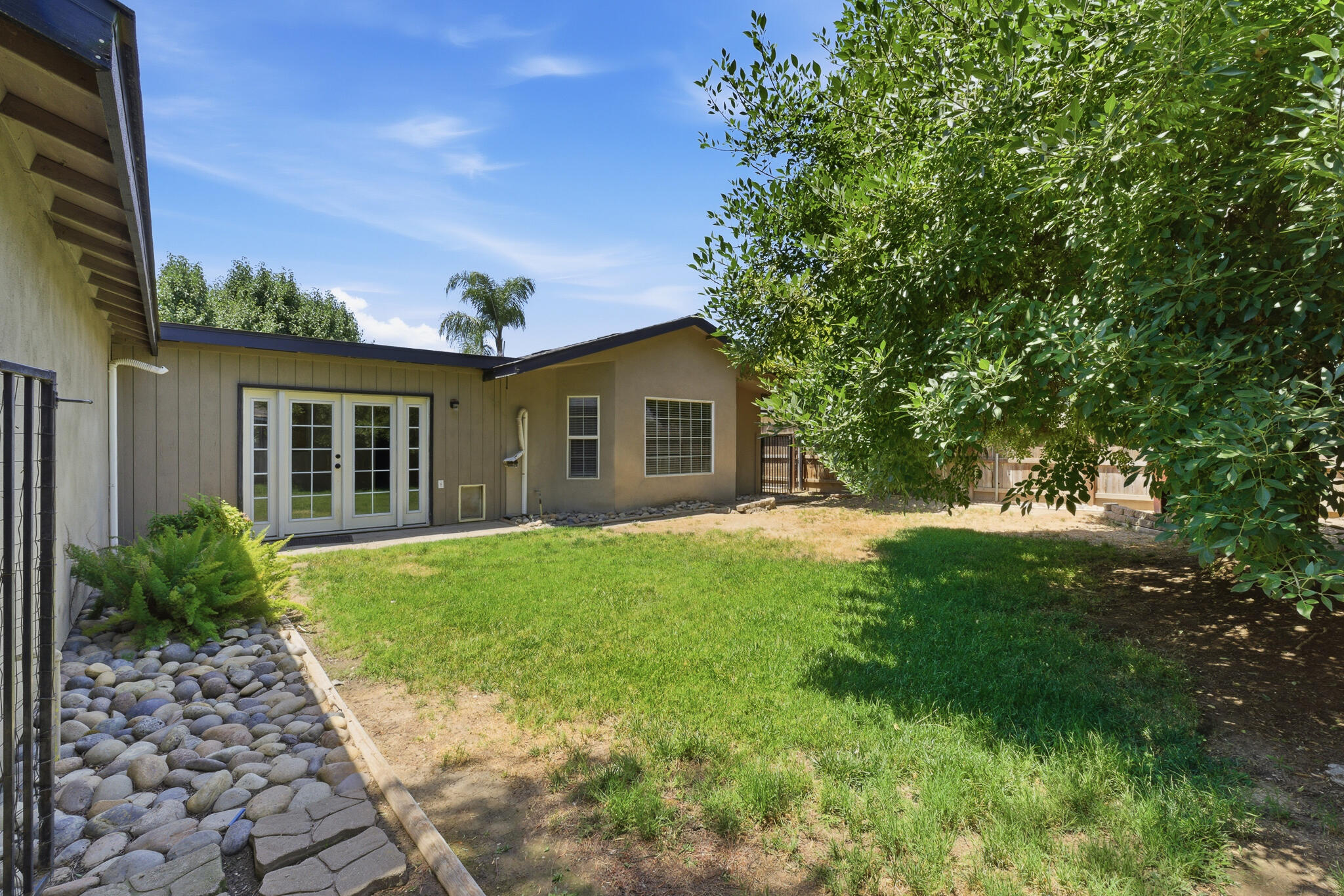 618 Birdsong Court Exeter, CA 93221 - Photo 58 of 62 a view of a house with a backyard