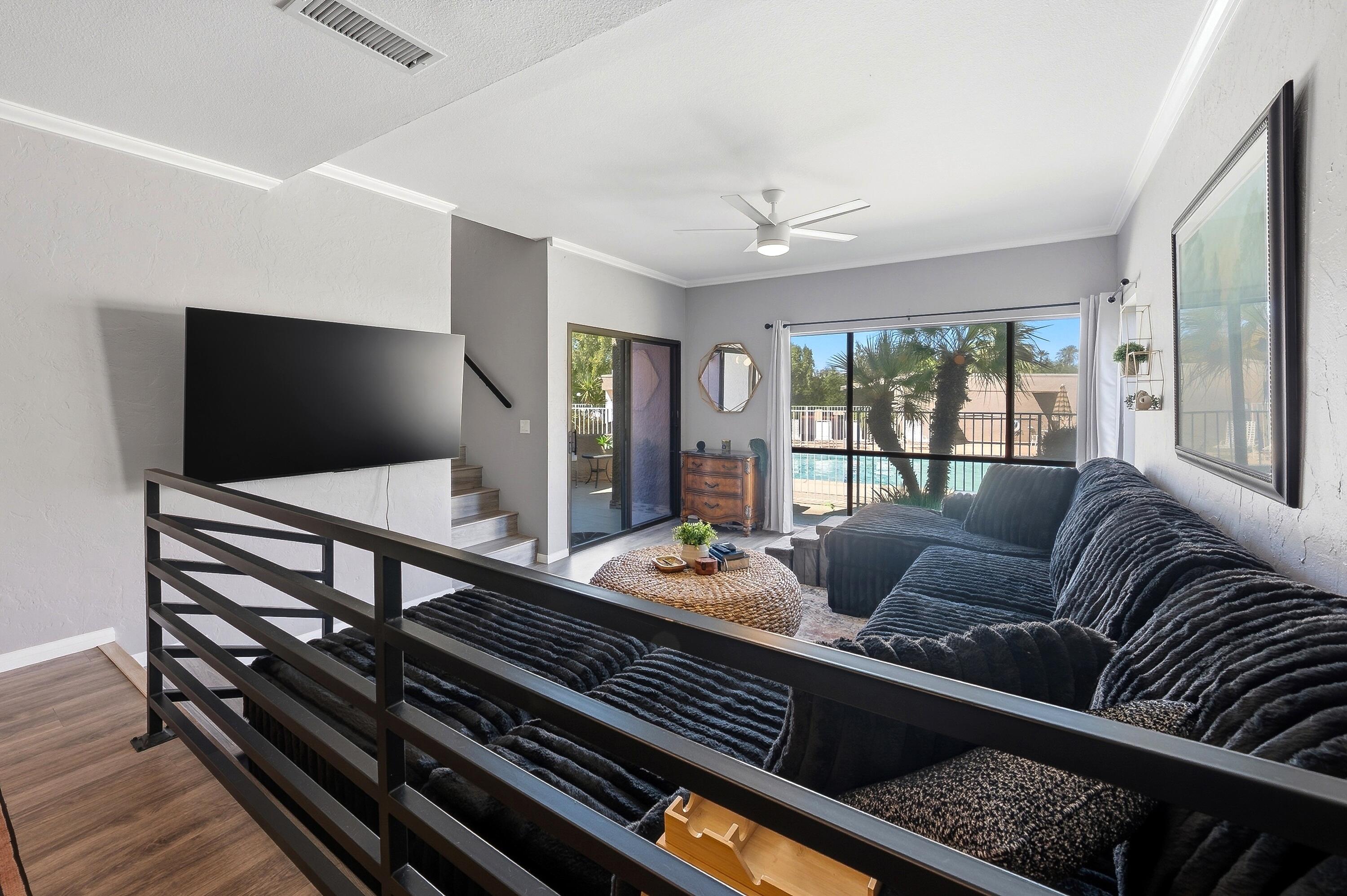 71870 Eleanora Lane Rancho Mirage, CA 92270 - Photo 1 of 36 a living room with furniture and a flat screen tv