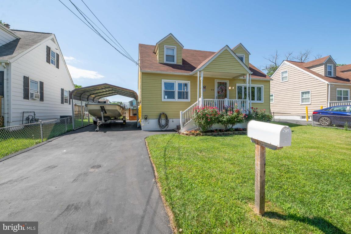 519 Cresswell Road Baltimore, MD 21225 - Photo 39 of 40 Long driveway with carpot
