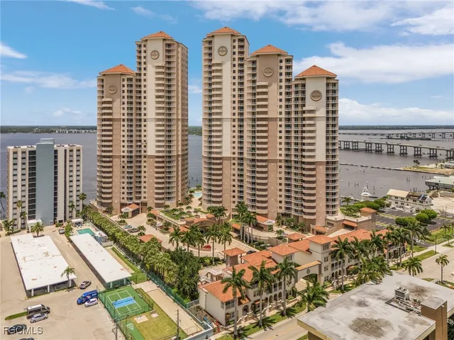 a view of a city with tall buildings