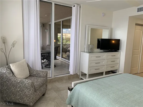 a bedroom with a bed and furniture