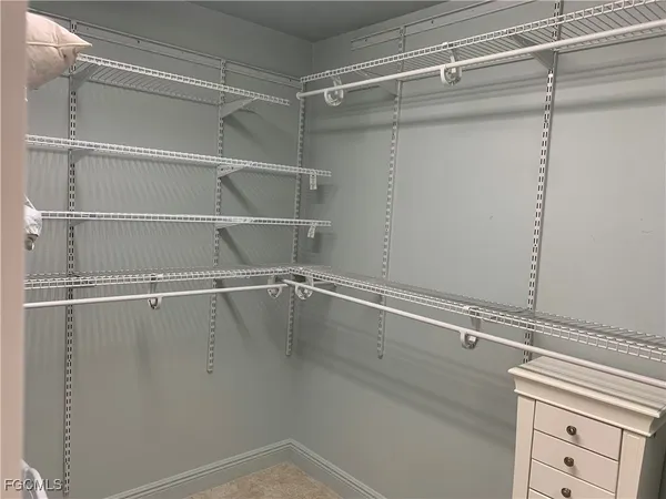 a view of an empty walk in closet