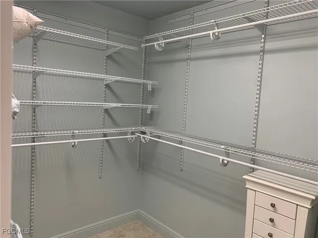 a view of an empty walk in closet