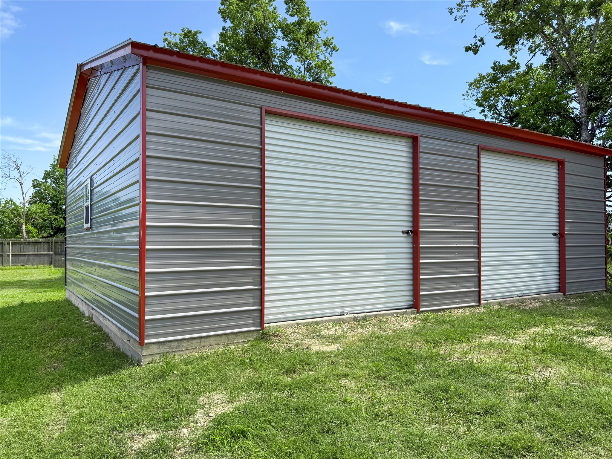 845 Caldwell Street Lexington, TX 78947 - Photo 27 of 39 View of outbuilding 2 car garage/workshop on slab
