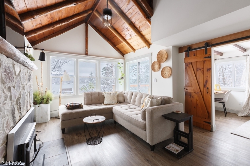 377 Lakeside Road West Milford, NJ 07421 - Photo 4 of 22 a living room with furniture and a large window