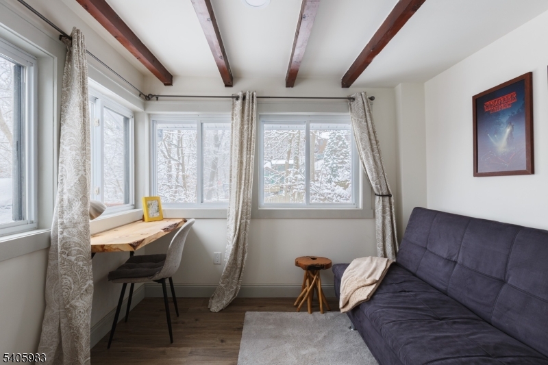 377 Lakeside Road West Milford, NJ 07421 - Photo 10 of 22 a room with chairs and window