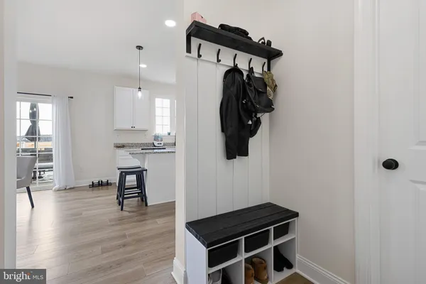 a view of kitchen and wooden floor