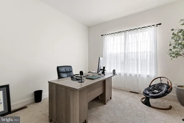 a room with furniture and window
