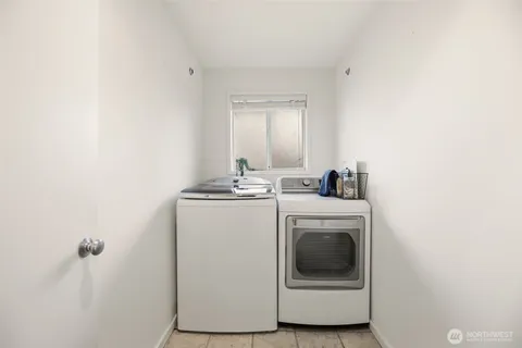 a room with furniture and wooden floor