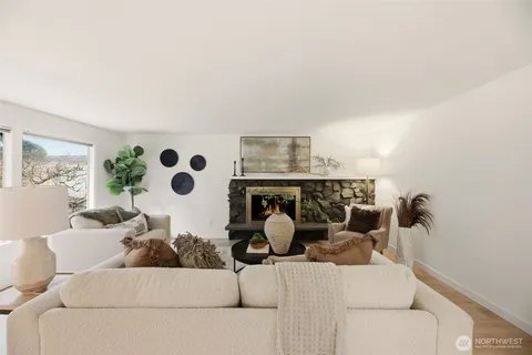 a living room with furniture and decor