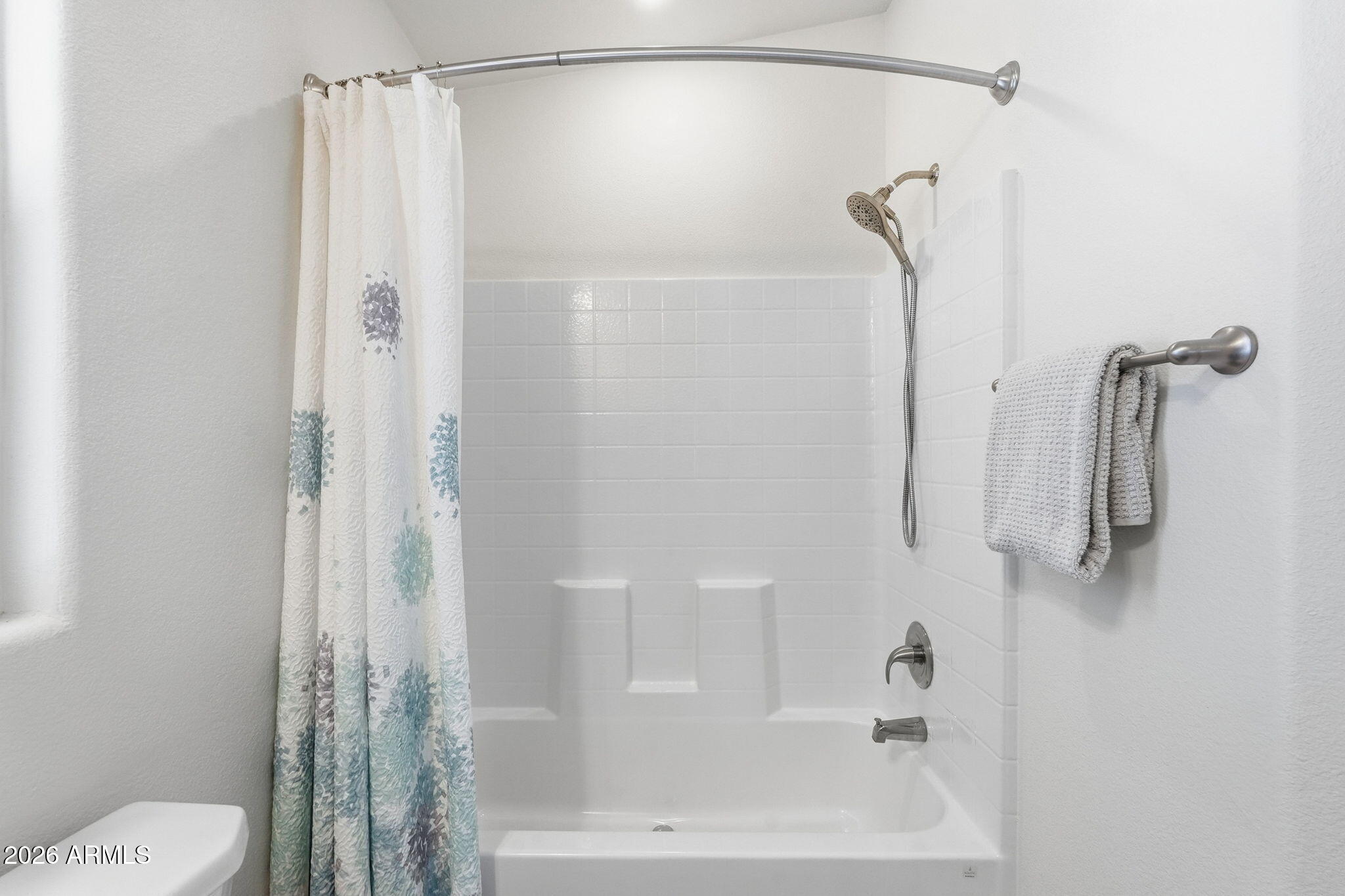 8865 East Baseline Road, Unit 74B Mesa, AZ 85209 - Photo 25 of 55 a bathroom with a shower and a bath tub