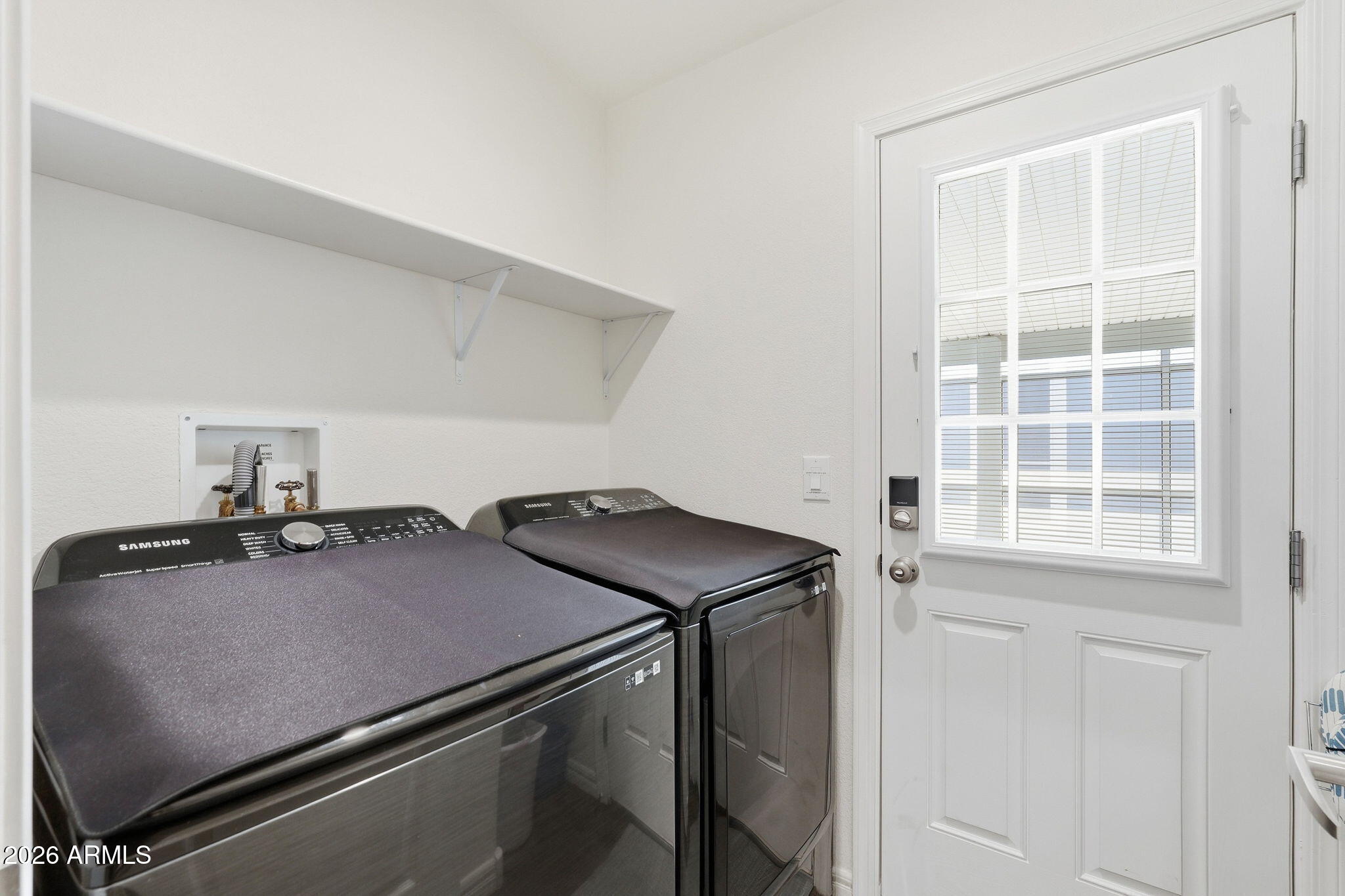 8865 East Baseline Road, Unit 74B Mesa, AZ 85209 - Photo 26 of 55 a room with storage and utility room