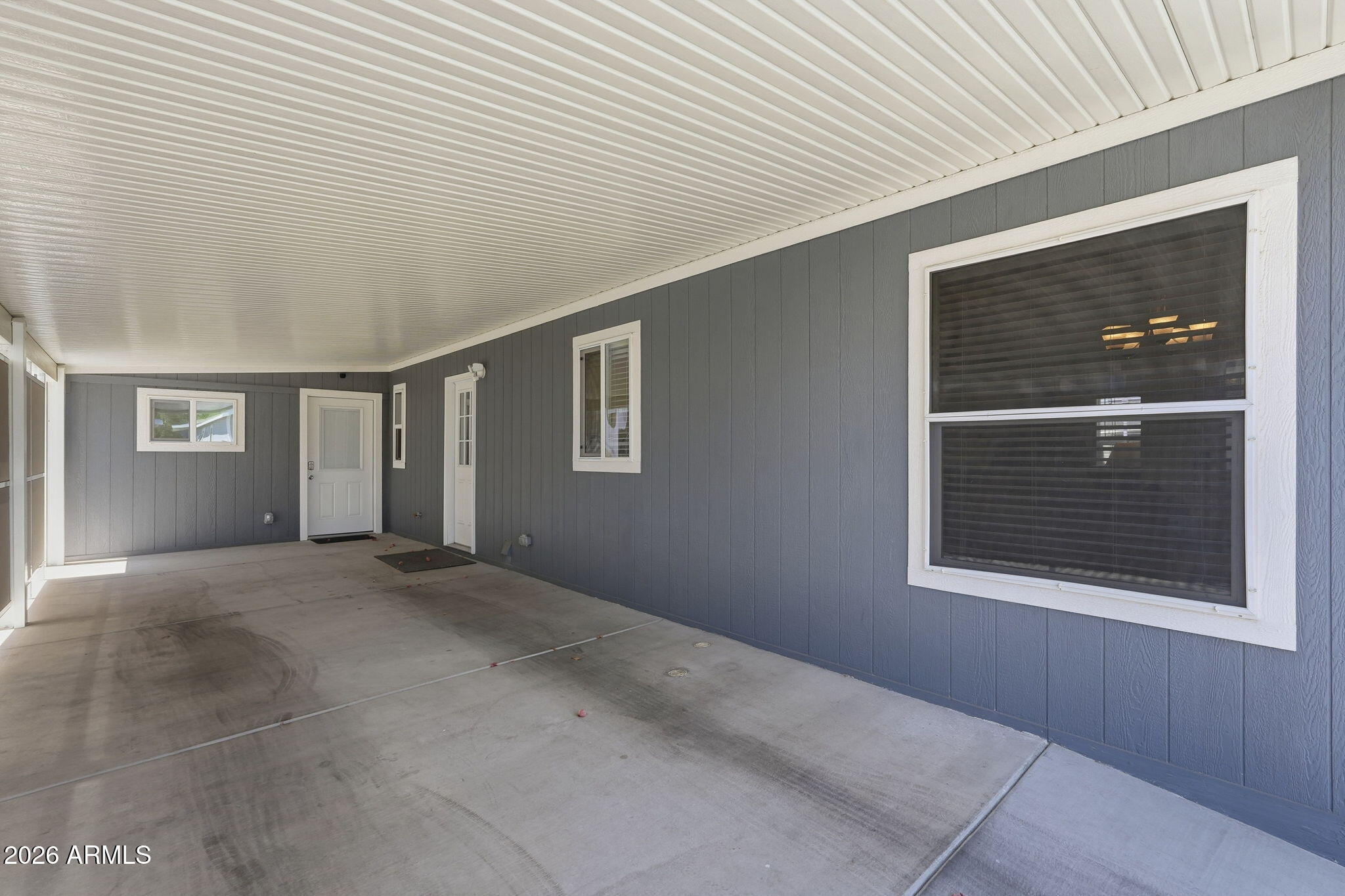 8865 East Baseline Road, Unit 74B Mesa, AZ 85209 - Photo 32 of 55 a view of an empty room with windows