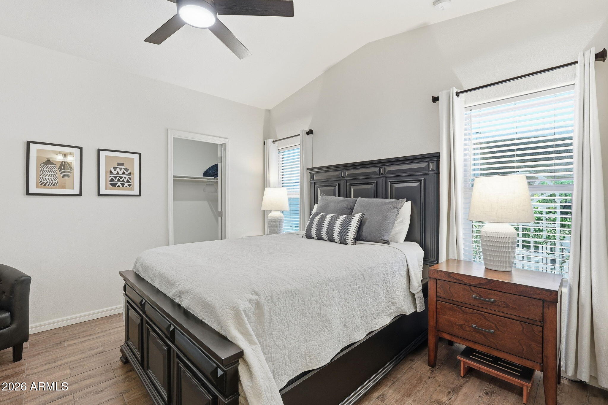 8865 East Baseline Road, Unit 74B Mesa, AZ 85209 - Photo 4 of 55 a bedroom with a bed and a window