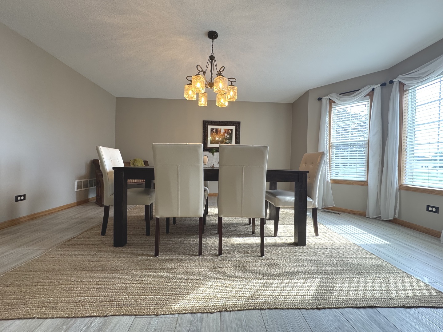 2041 Bluff Road South Kankakee, IL 60901 - Photo 12 of 39 a view of a dining room with furniture and chandelier