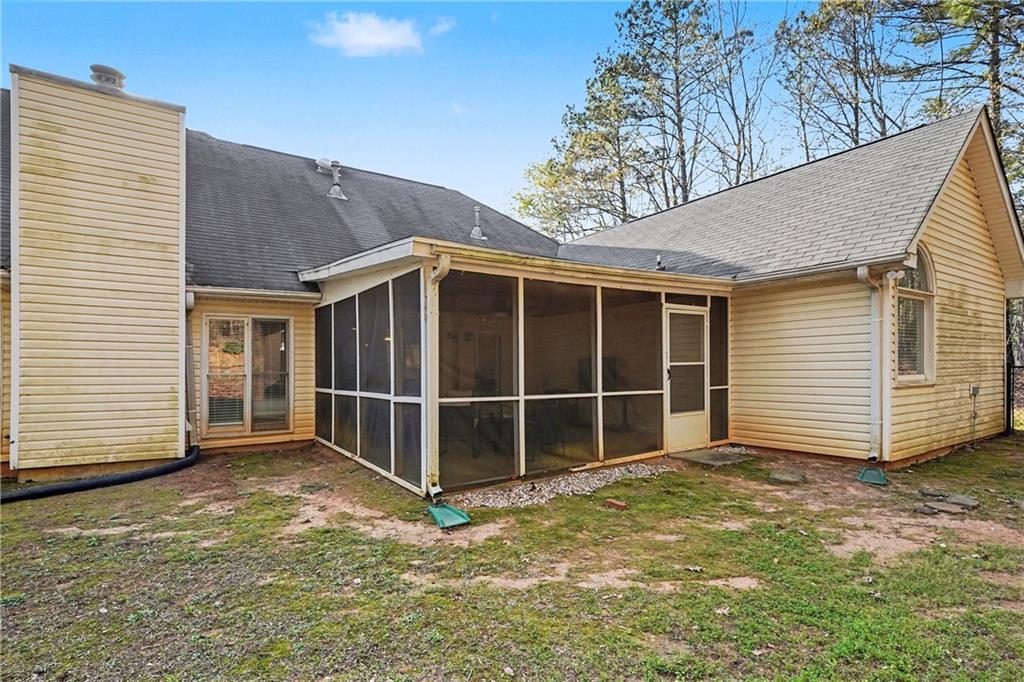 570 Morgan Court Hampton, GA 30228 - Photo 30 of 31 a view of a house with a yard
