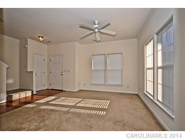 5028 Prosperity Ridge Road, Unit 5028 Charlotte, NC 28269 - Photo 3 of 16 a view of an empty room with a window