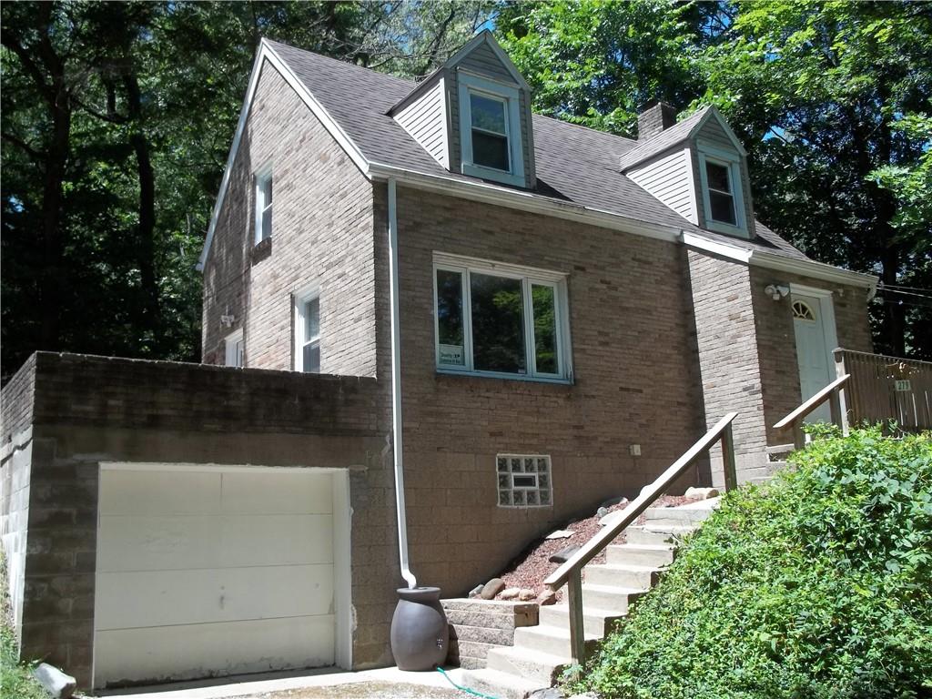279 McCoy Road McKees Rocks, PA 15136 - Photo 1 of 32 a view of a house with wooden fence