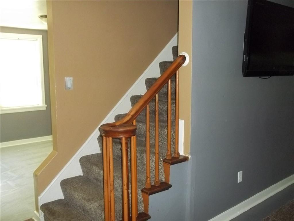 279 McCoy Road McKees Rocks, PA 15136 - Photo 6 of 32 a view of entryway and hall with wooden floor