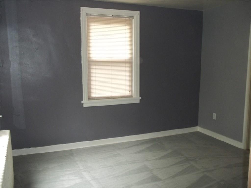 279 McCoy Road McKees Rocks, PA 15136 - Photo 8 of 32 an empty room with a window