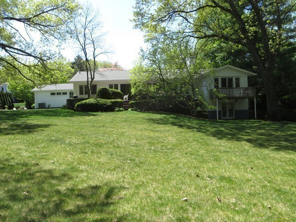 33 Woodfall Road Belmont, MA 02478 - Photo 17 of 22 a view of a house with backyard and sitting area