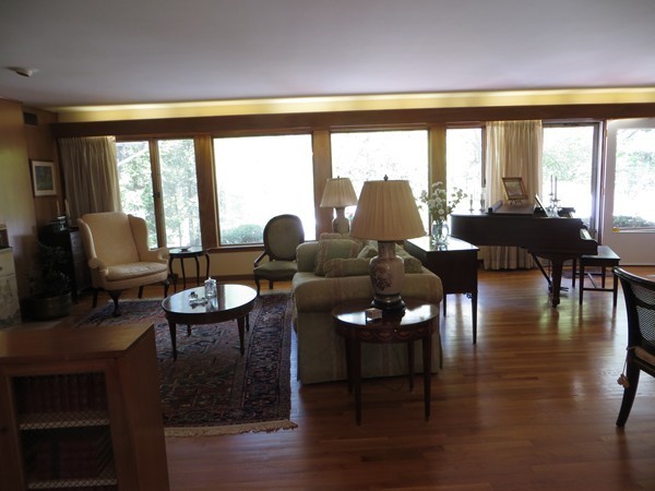33 Woodfall Road Belmont, MA 02478 - Photo 2 of 22 a living room with furniture and floor to ceiling windows
