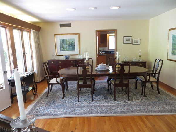 33 Woodfall Road Belmont, MA 02478 - Photo 6 of 22 a view of a dining room with furniture