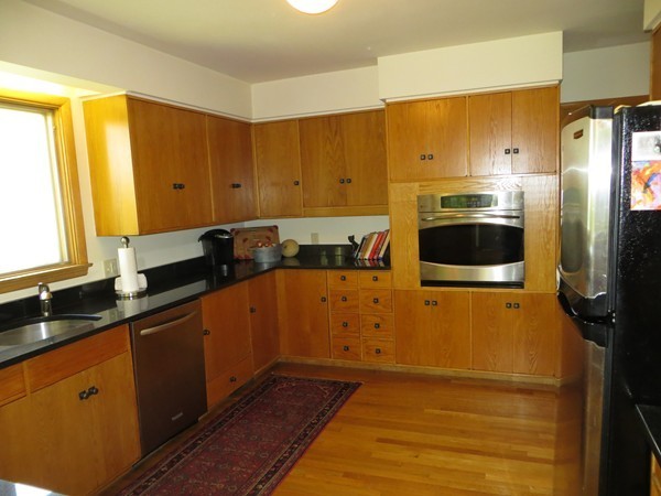 33 Woodfall Road Belmont, MA 02478 - Photo 8 of 22 a kitchen with stainless steel appliances a stove a sink and a refrigerator