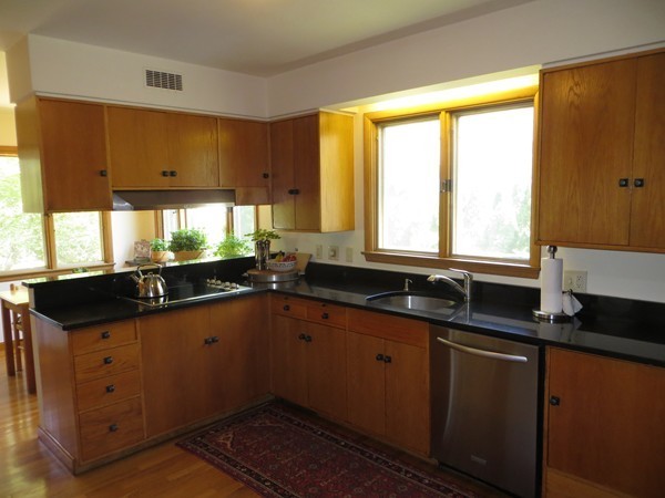 33 Woodfall Road Belmont, MA 02478 - Photo 9 of 22 a kitchen with granite countertop a sink and a cabinets