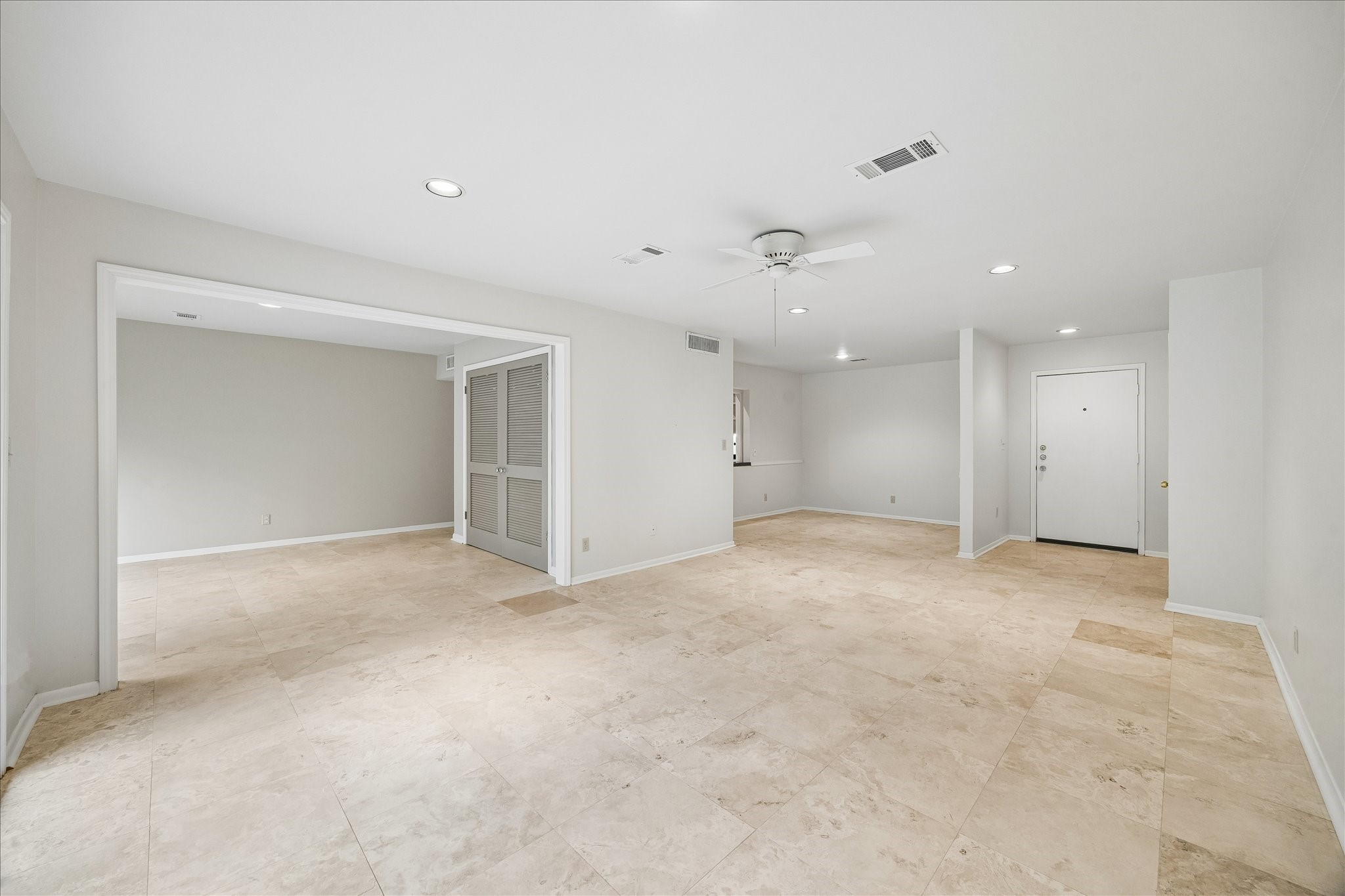 6659 Bayou Glen Road Houston, TX 77057 - Photo 7 of 23 As you can see, the condo has a perfect blend of defined spaces with an open feel. Recessed lighting, beautiful travertine natural stone flooring and soft neutral tones complete the look!