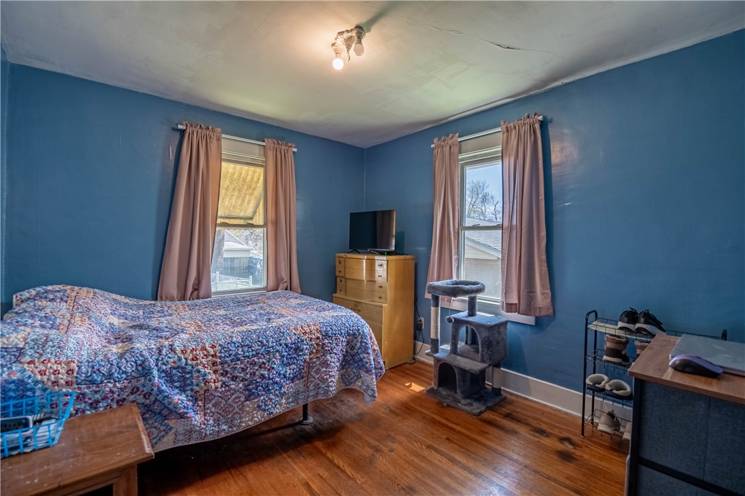 514 South 22nd Street Decatur, IL 62521 - Photo 9 of 15 a bedroom with a bed and a window
