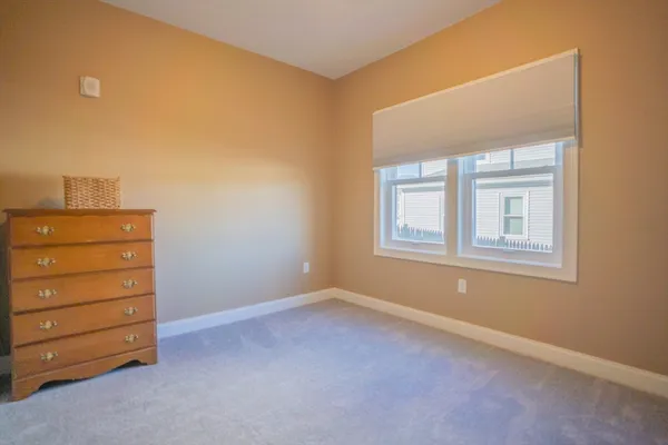 a room with furniture and a window