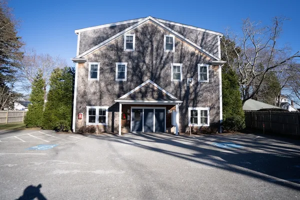 a view of a house with a street