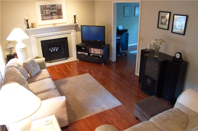 3204 Cedar Ridge Road Nashville, TN 37214 - Photo 1 of 8 Living room has beautiful hardwood floors and a nice, wood burning fireplace.