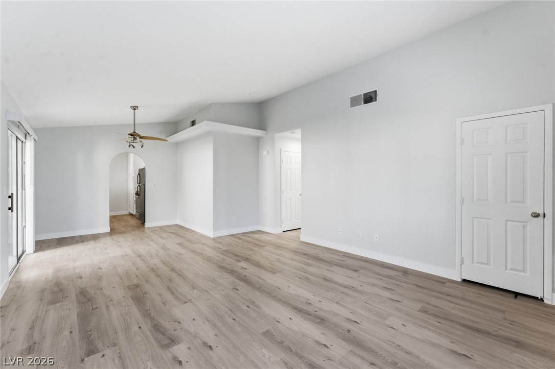 5449 Bugle Way, Unit 104 Las Vegas, NV 89108 - Photo 7 of 33 Bright and open, this inviting space features modern flooring and a seamless flow for daily living.