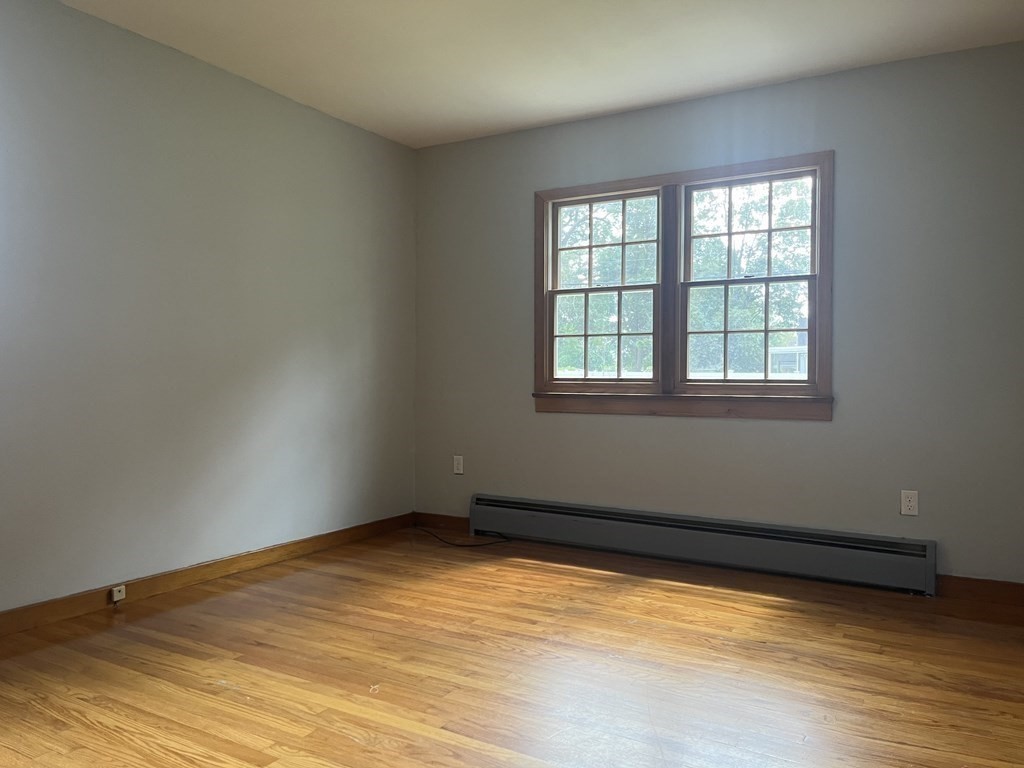 631 Allen Street Springfield, MA 01118 - Photo 5 of 15 a view of a room with a window