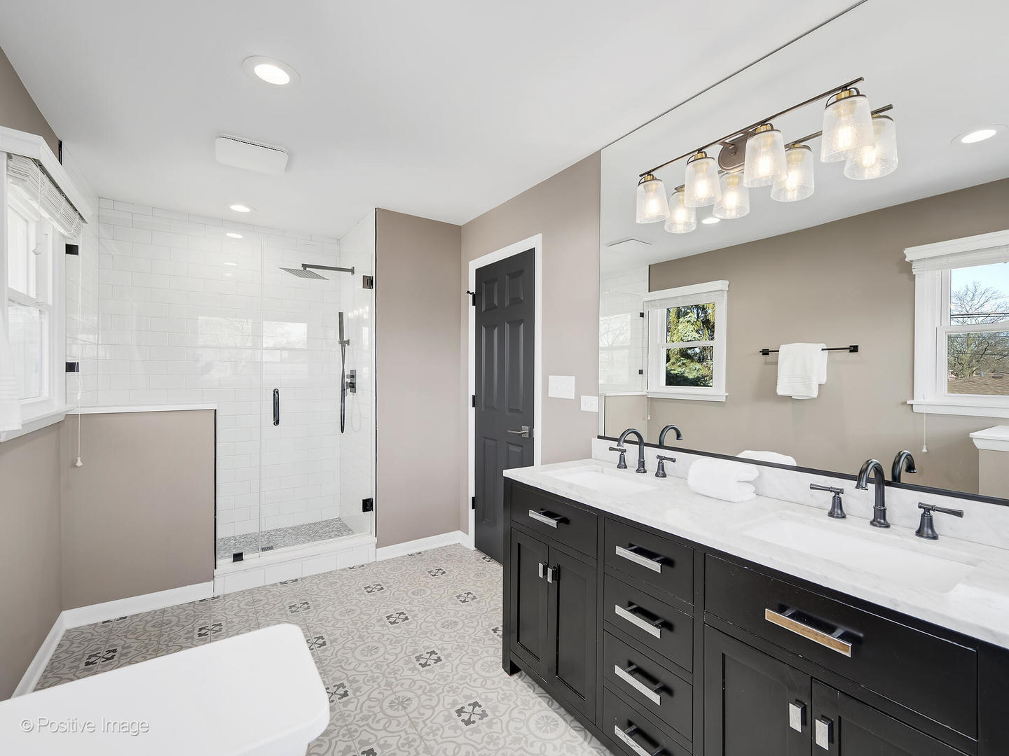 452 East Adams Street Elmhurst, IL 60126 - Photo 14 of 27 a bathroom with a sink a toilet and a mirror