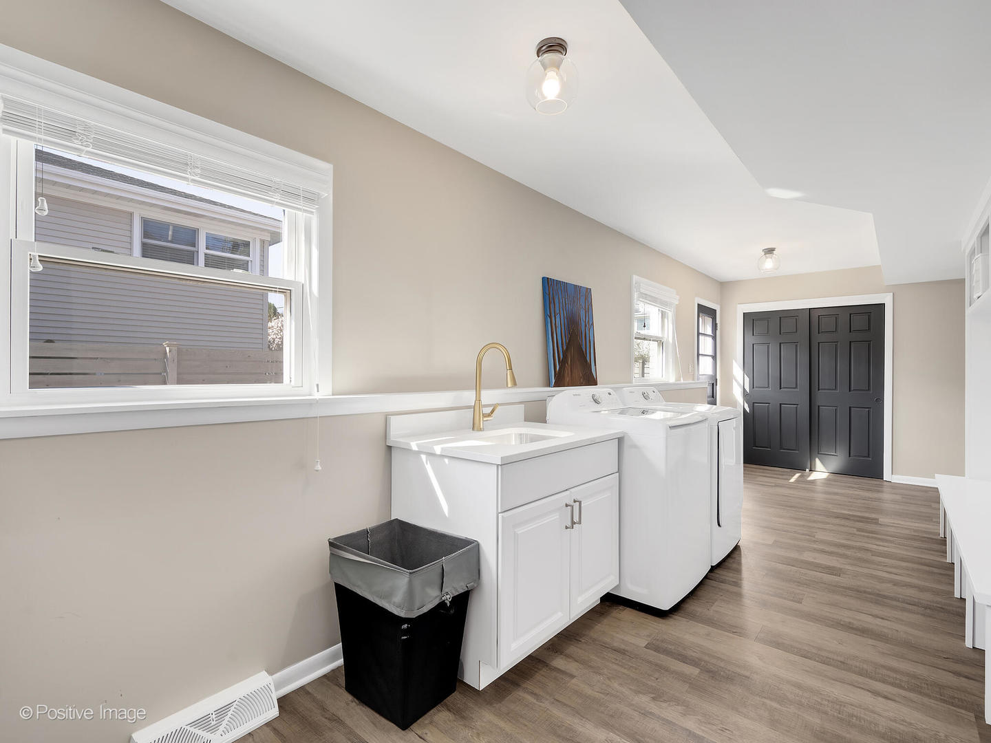 452 East Adams Street Elmhurst, IL 60126 - Photo 19 of 27 a en suite bathroom with a sink double vanity and a mirror
