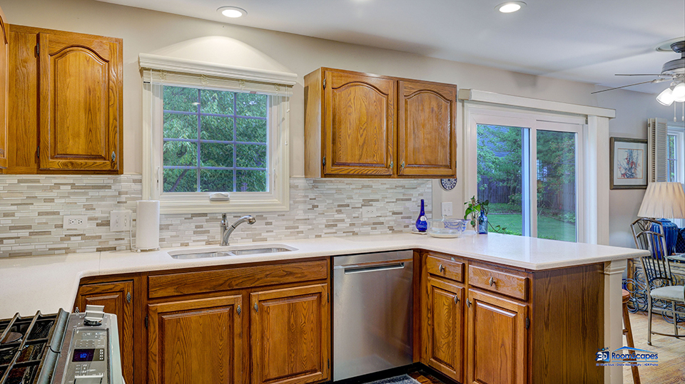 245 Pilgrims Path Gurnee, IL 60031 - Photo 11 of 54 a kitchen with stainless steel appliances granite countertop a sink stove and cabinets