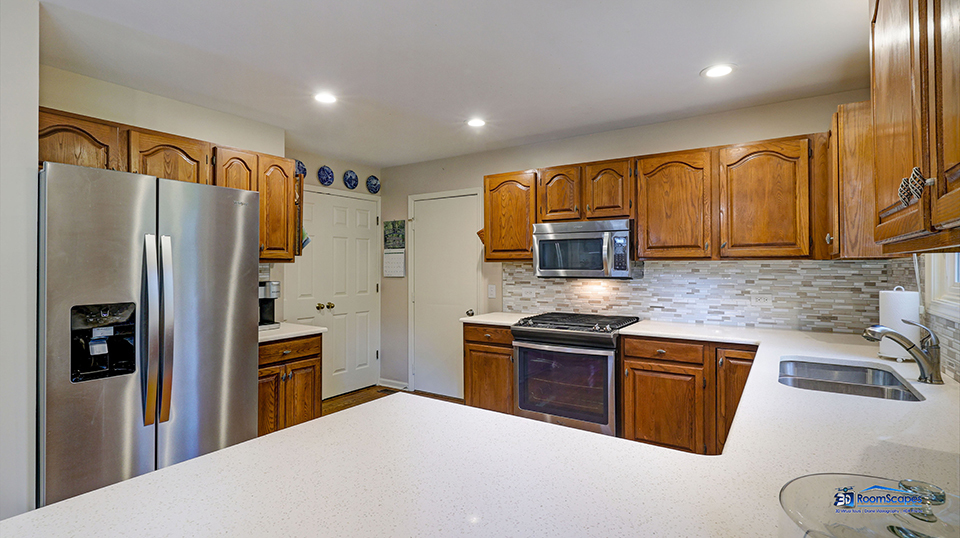 245 Pilgrims Path Gurnee, IL 60031 - Photo 13 of 54 a kitchen with stainless steel appliances granite countertop a refrigerator a stove top oven a sink and dishwasher