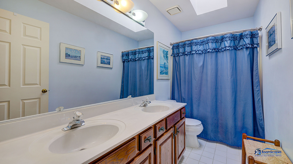 245 Pilgrims Path Gurnee, IL 60031 - Photo 22 of 54 a bathroom with a sink a toilet and shower
