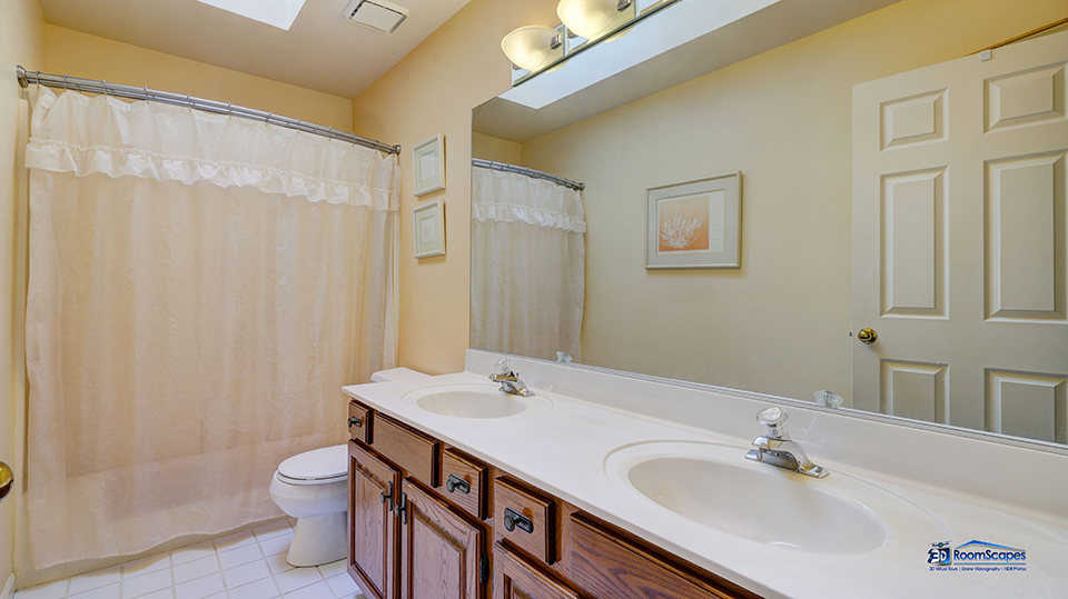 245 Pilgrims Path Gurnee, IL 60031 - Photo 23 of 54 a bathroom with a sink a toilet and shower