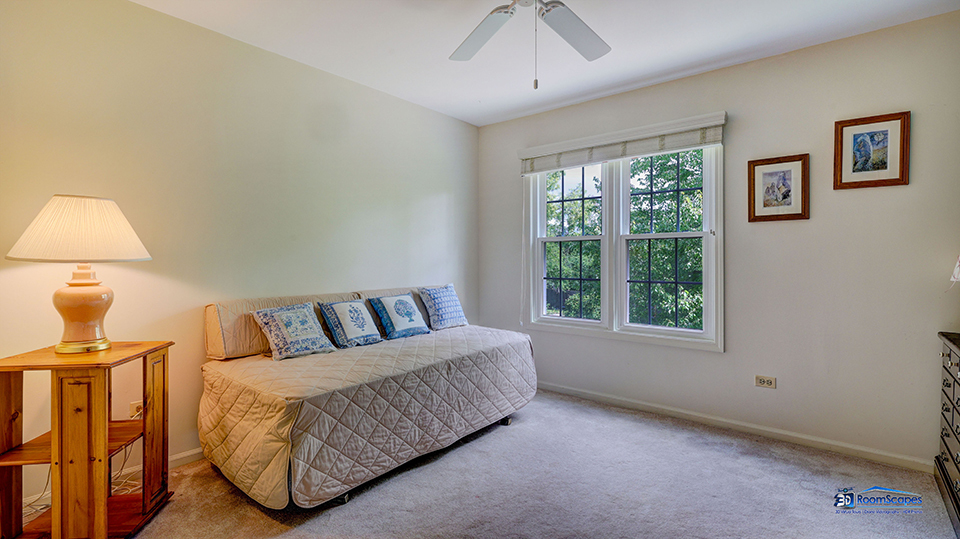 245 Pilgrims Path Gurnee, IL 60031 - Photo 24 of 54 a living room with a bed furniture and a window