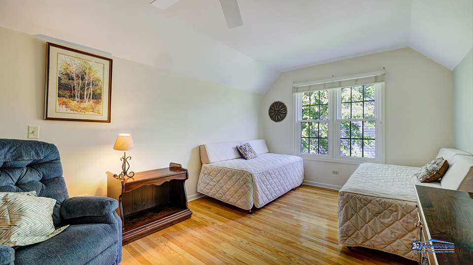 245 Pilgrims Path Gurnee, IL 60031 - Photo 28 of 54 a living room with a bed and a window